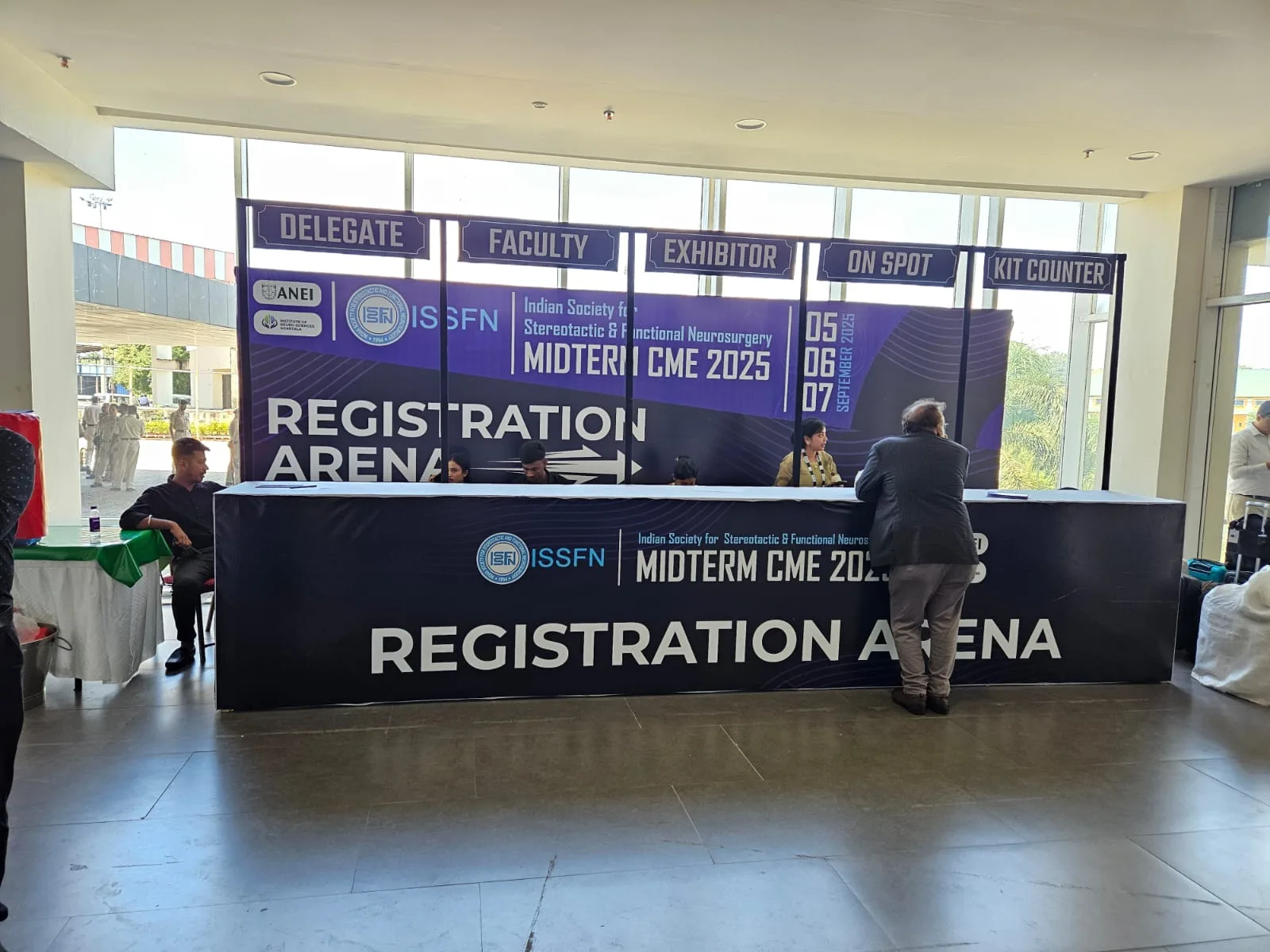 The welcome and registration area at ISSFN Midterm CME 2025